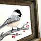Chickadee with red berries